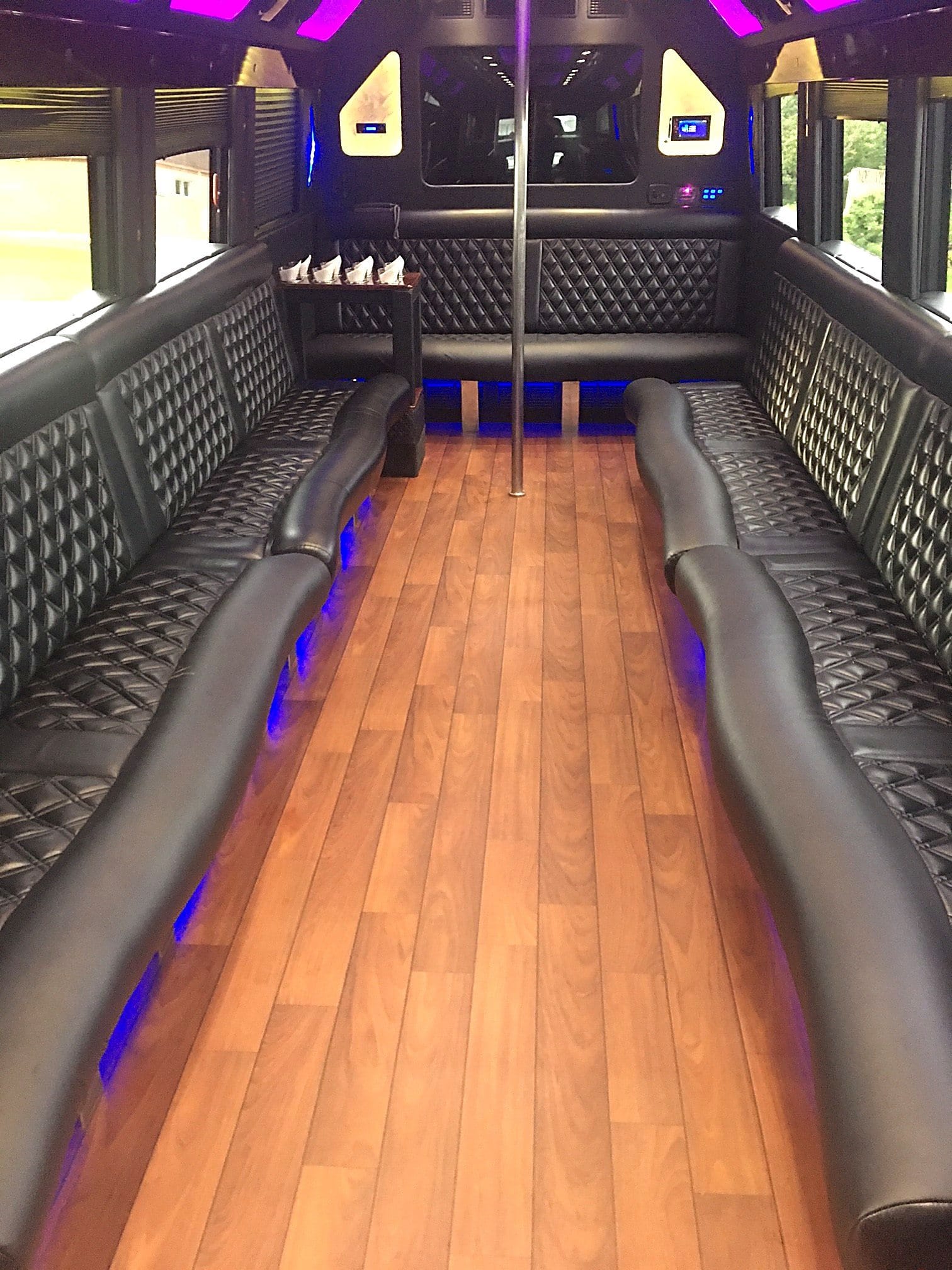 Luxury party bus exterior at sunset
